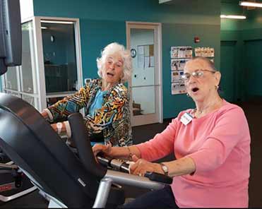 Two Senior Women exercising which is good for their brain