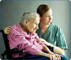 Caregiver taking good care of an elderly patient