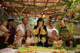 A family in their Sukkah