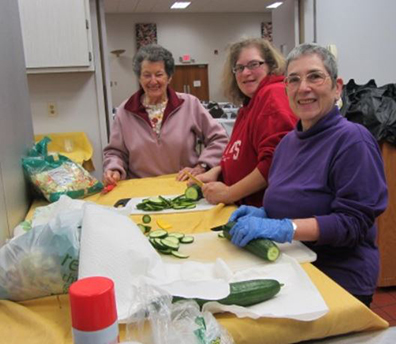 Women preparing vegetables