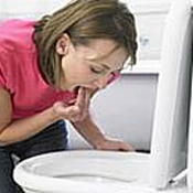Woman throwing up from an eating disorder