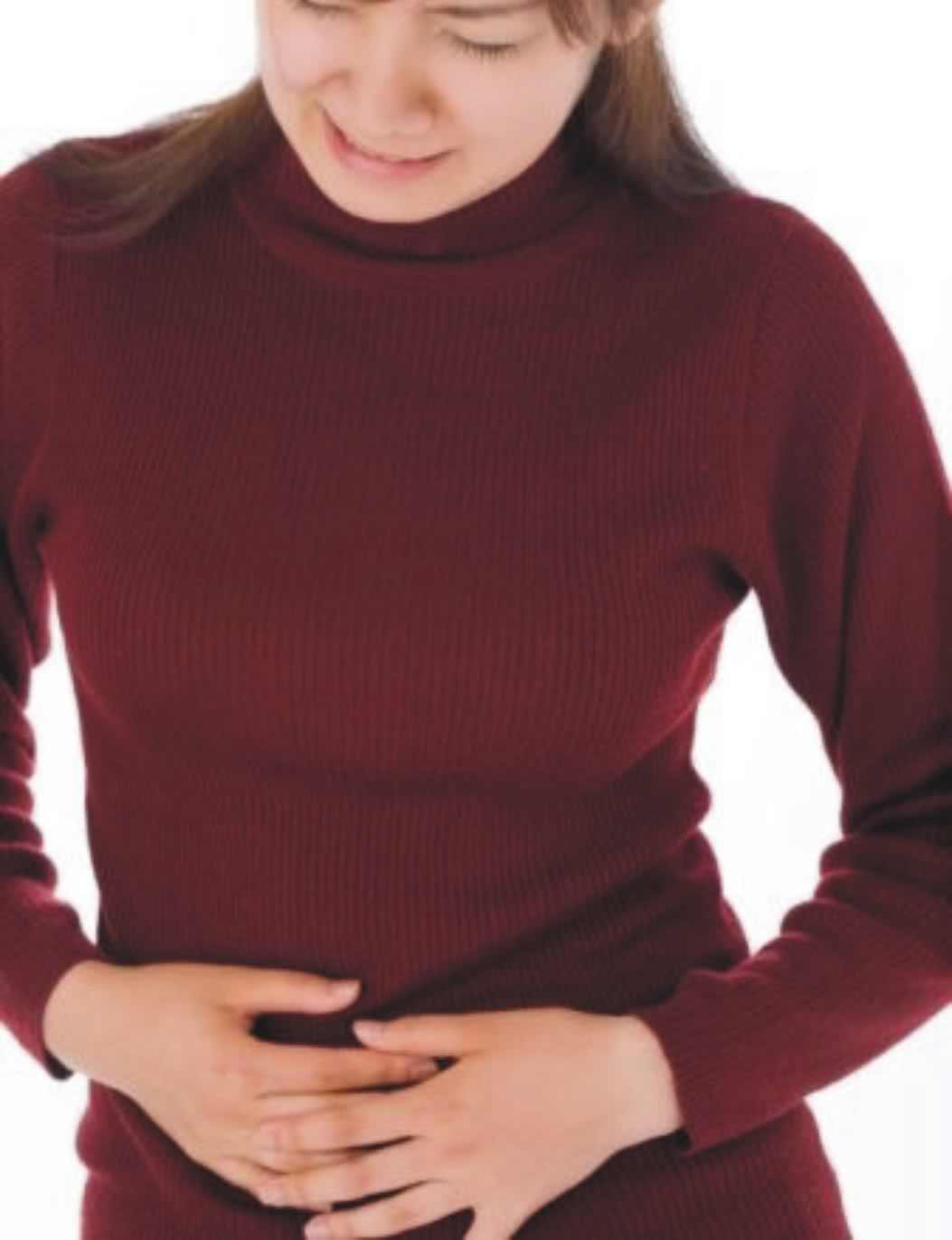 Woman with stomach pain from Celiac Disease